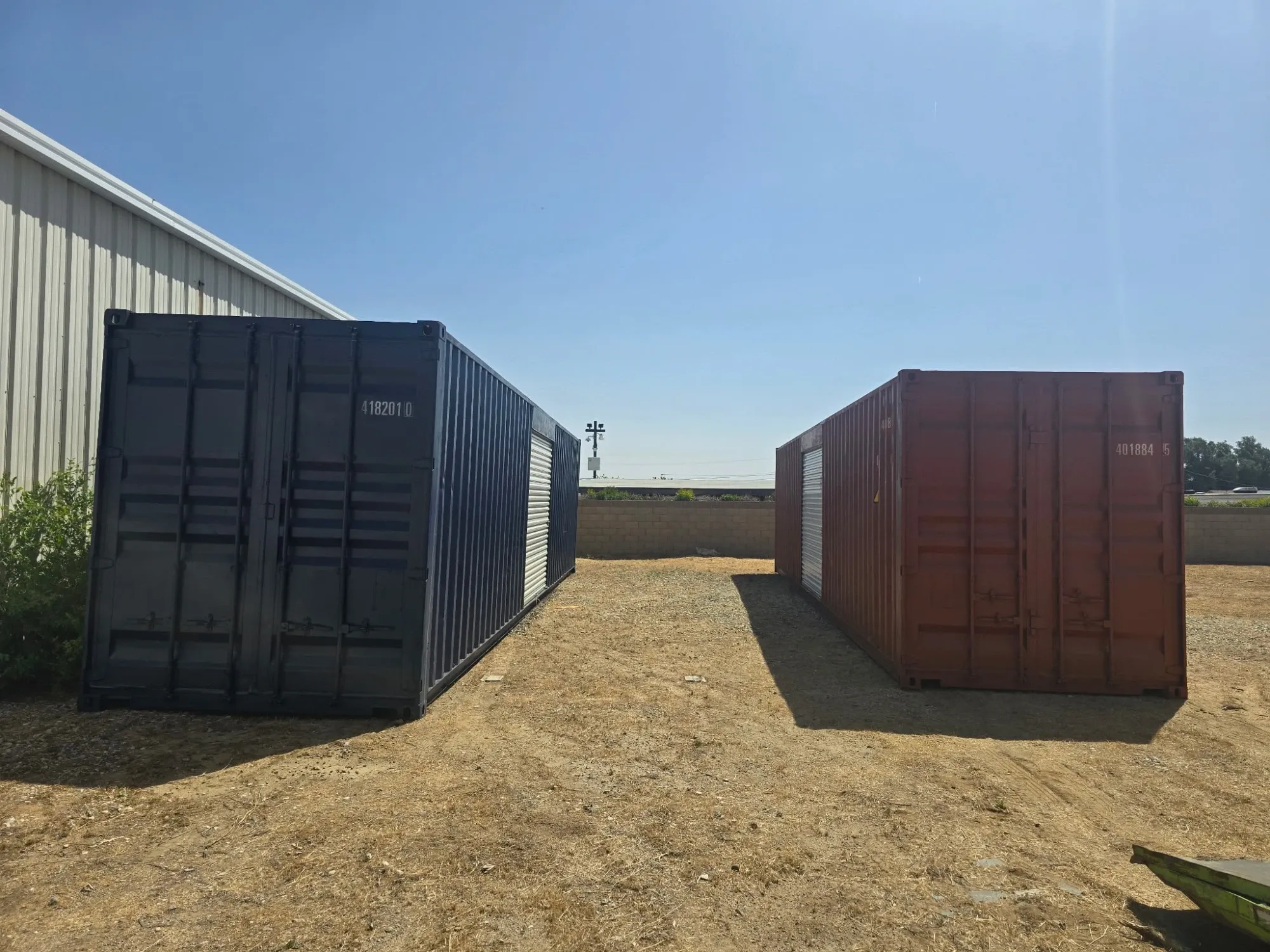 Two 40 ft containers with side roll-up doors